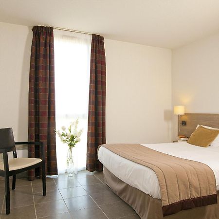 Apparthotel Sejours & Affaires Маноск Номер фото