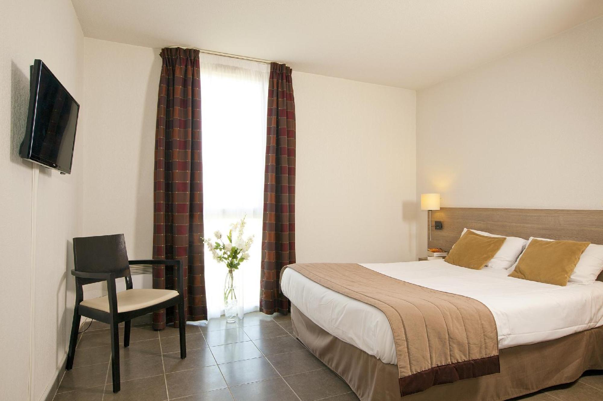 Apparthotel Sejours & Affaires Маноск Номер фото